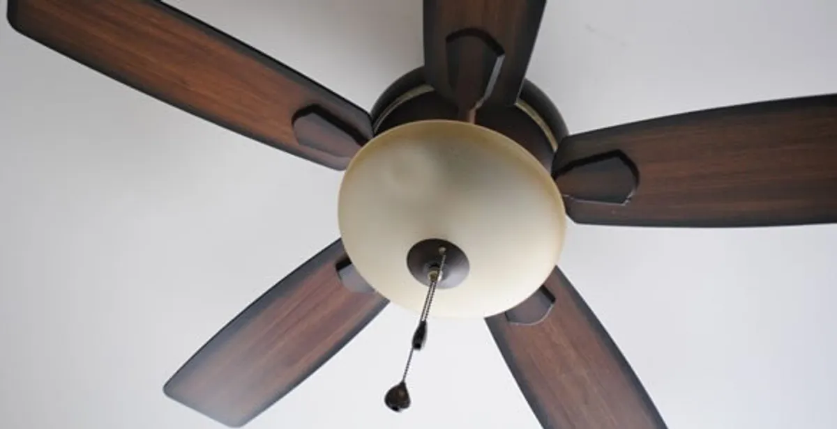 Fully installed ceiling fan with balanced blades and light fixture in Sacramento, CA