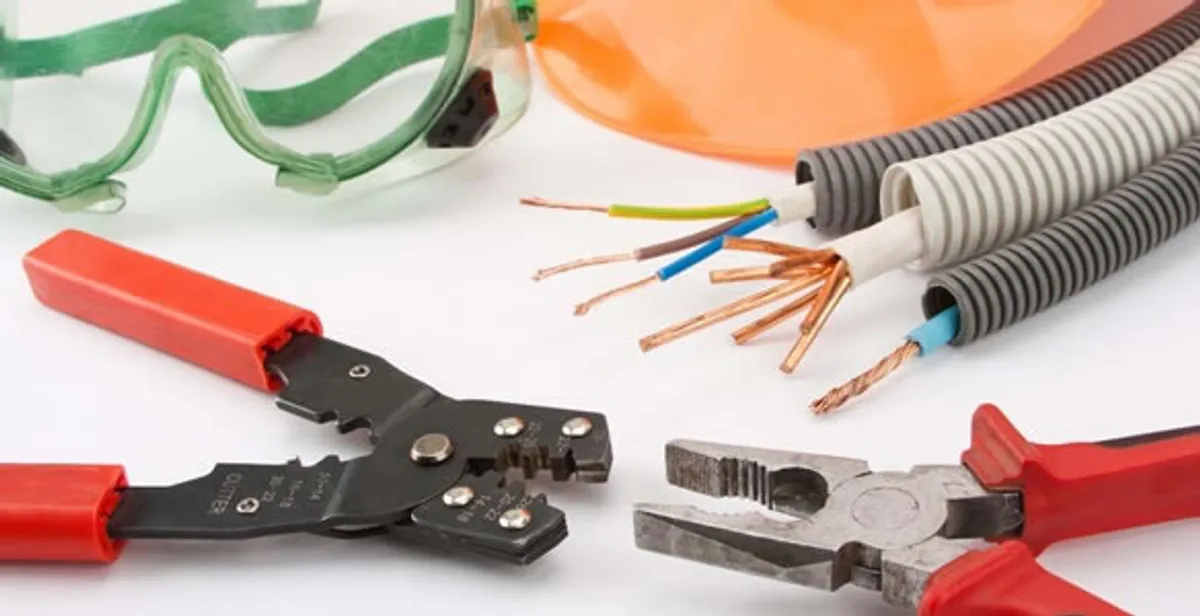 Electrical wiring repair with professional tools and safety equipment in Davis, CA