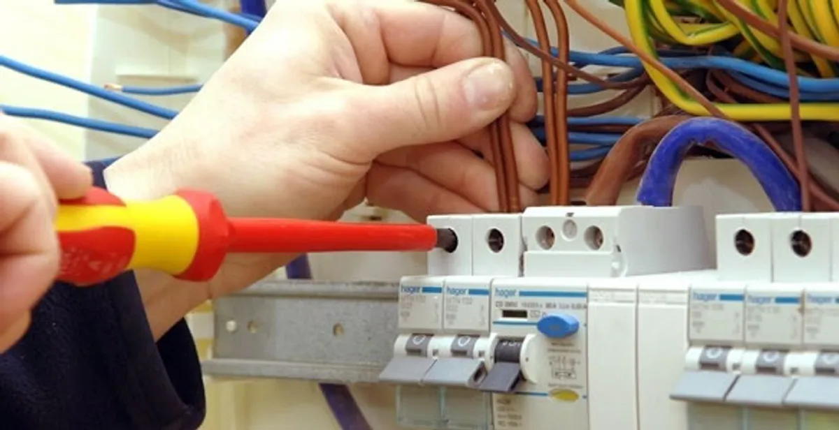 electrician services performing professional electrical panel wiring and connections in Sacramento, CA
